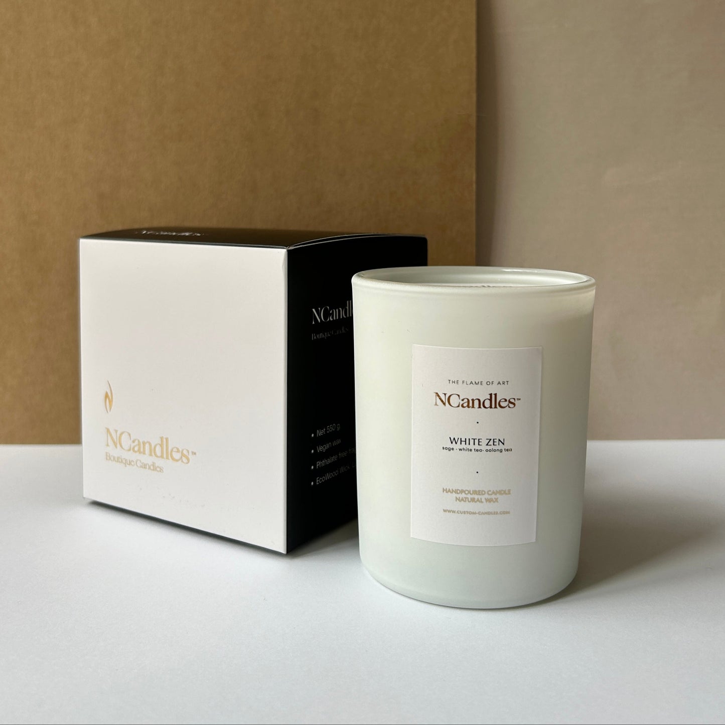 white candles with black box